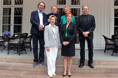Kjell Nupen, Ørnulf Opdahl, Karin Hellandsjø, Ole Larsen (back row), left to right). HM Queen Sonja and Award Winner 2012; Tiina Kivinen (front row)